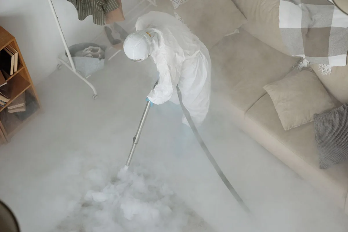 Biohazard cleanup technician in protective equipment, Cathedral City, CA